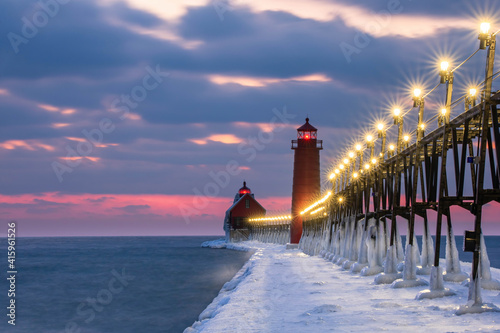 Grand Haven lighthouse sunset on Lake Michigan, in winter time