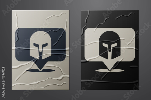 White Greek helmet icon isolated on crumpled paper background. Antiques helmet for head protection soldiers with a crest of feathers or horsehair. Paper art style. Vector.