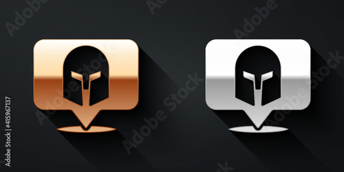 Gold and silver Greek helmet icon isolated on black background. Antiques helmet for head protection soldiers with a crest of feathers or horsehair. Long shadow style. Vector.