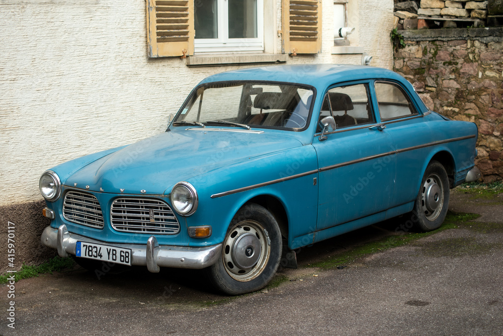 Eguisheim - France - 22 February 2021 - Front view of blue vintage Volvo  Amazon 1966 car parked in the street of alsatian village Stock Photo |  Adobe Stock