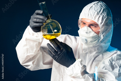 Virologist in a protective ...