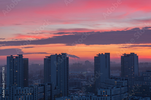 Minsk roofs of houses at sunset