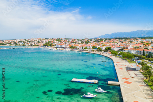 Beautiful Adriatic town of Novalja on the island of Pag in Croatia, aerial view from drone