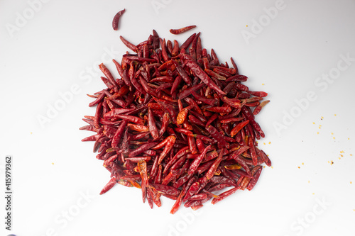 Chinese Sichuan dried chili peppers placed on pure white background