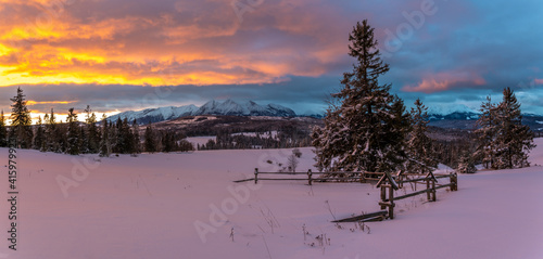 beautiful winter mountain landscape during dramatic sunrise