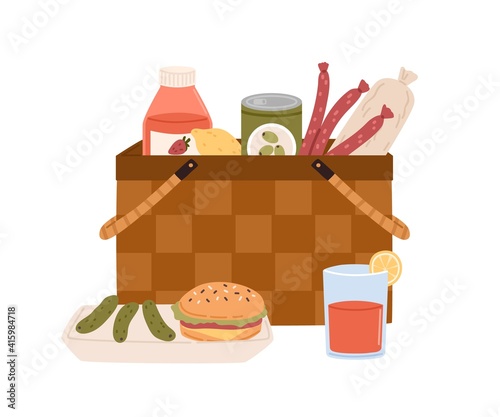 Composition of picnic basket with junk food and drink sausages, burger, pickl...