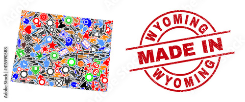 Component mosaic Wyoming State map and MADE IN textured rubber stamp. Wyoming State map mosaic composed with spanners, wheels, tools, items, transports, power strikes, rockets.