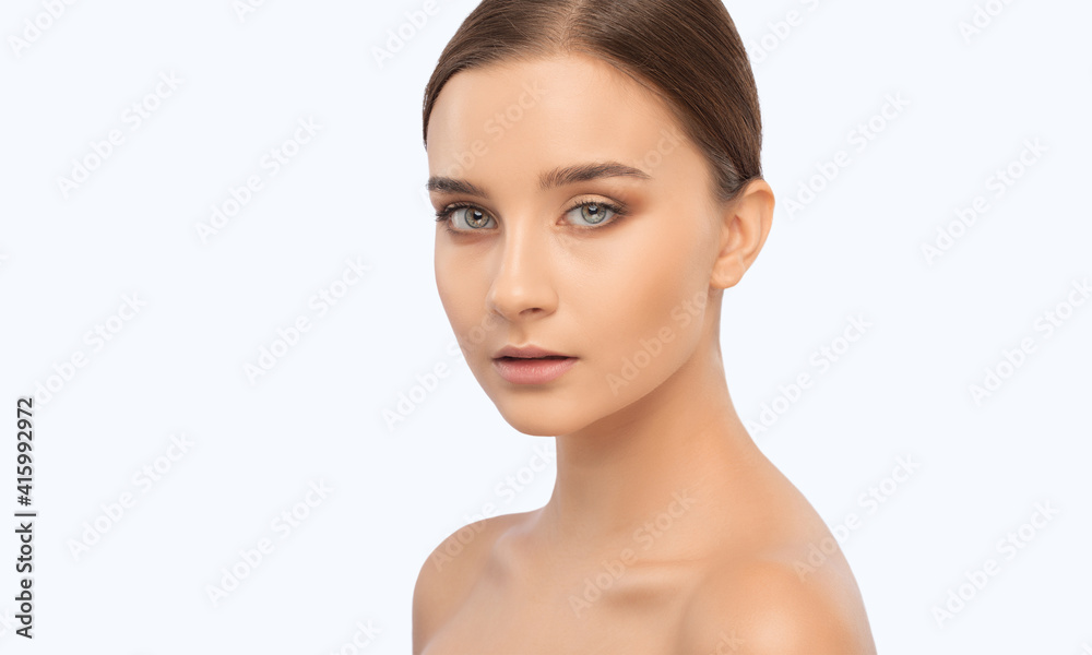Portrait of a beautiful brunette girl with healthy clean skin and fresh make-up. Aesthetic cosmetology and makeup concept. Portrait of a beautiful brunette girl with healthy clean skin and fresh make-up. Aesthetic cosmetology and makeup concept.
