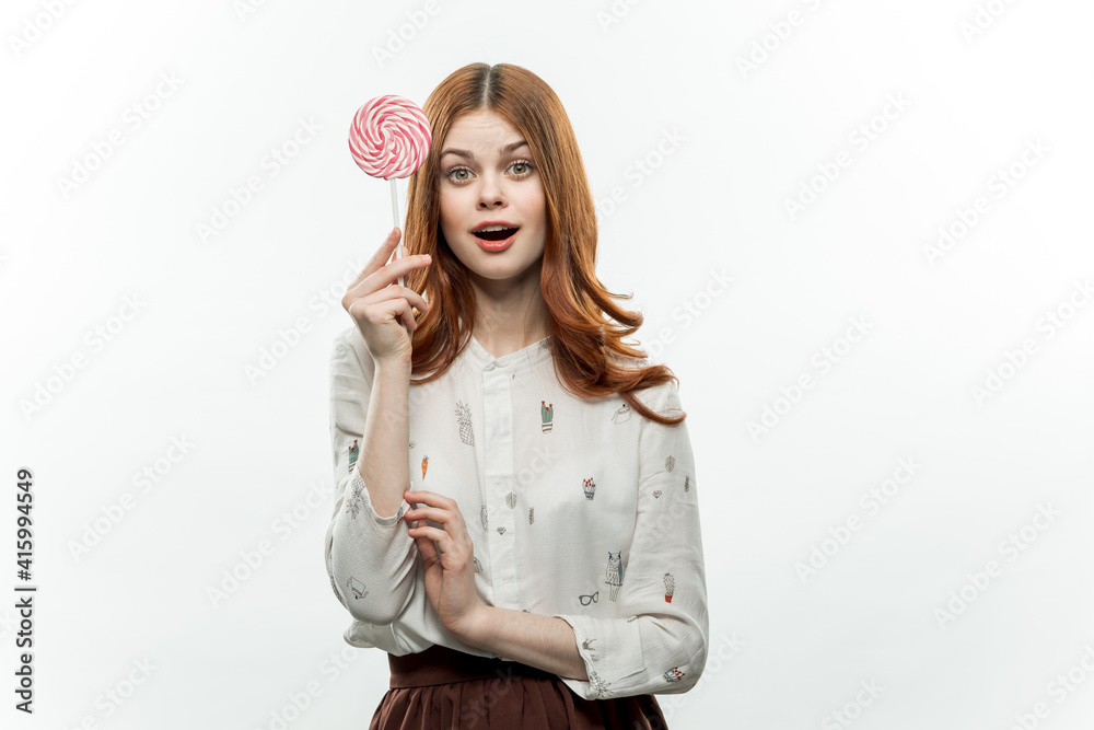 pretty woman with lollipop in hands sweets enjoyment pretty woman with lollipop in hands sweets enjoyment