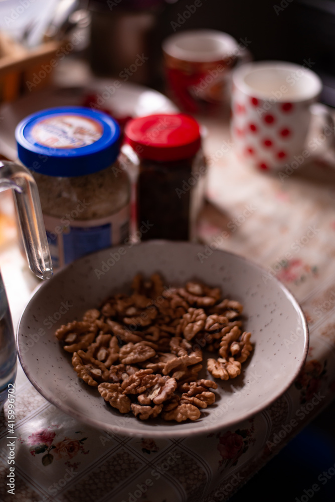 a plate with walnut kernels a plate with walnut kernels