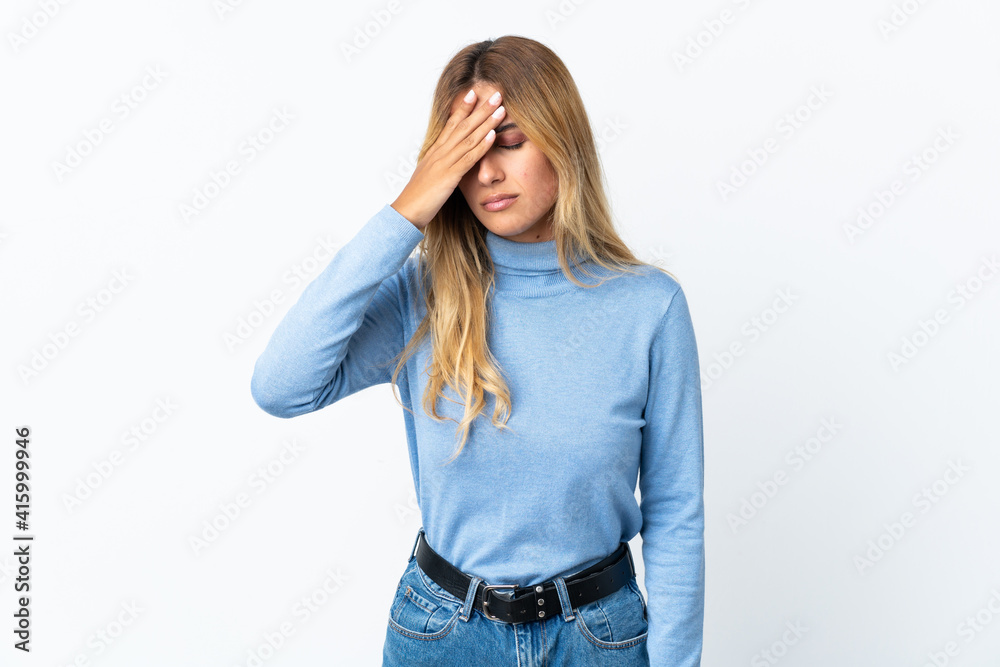 Young blonde Uruguayan woman over isolated background with headache Young blonde Uruguayan woman over isolated background with headache