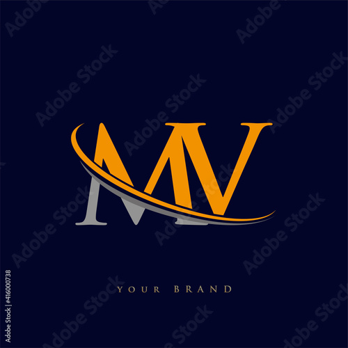 initial letter MV logotype company name yellow and grey swoosh design. isolated on dark background.