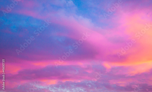 Sunset clouds of purple colors © Analia