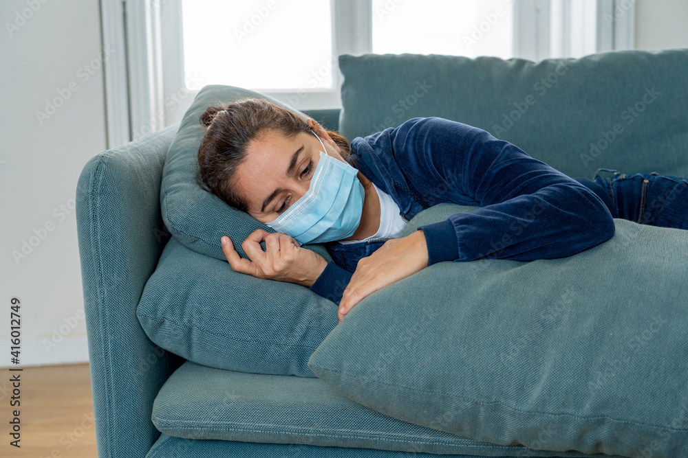 Lonely woman suffering from depression at home during coronavirus lockdown and social distancing Lonely woman suffering from depression at home during coronavirus lockdown and social distancing
