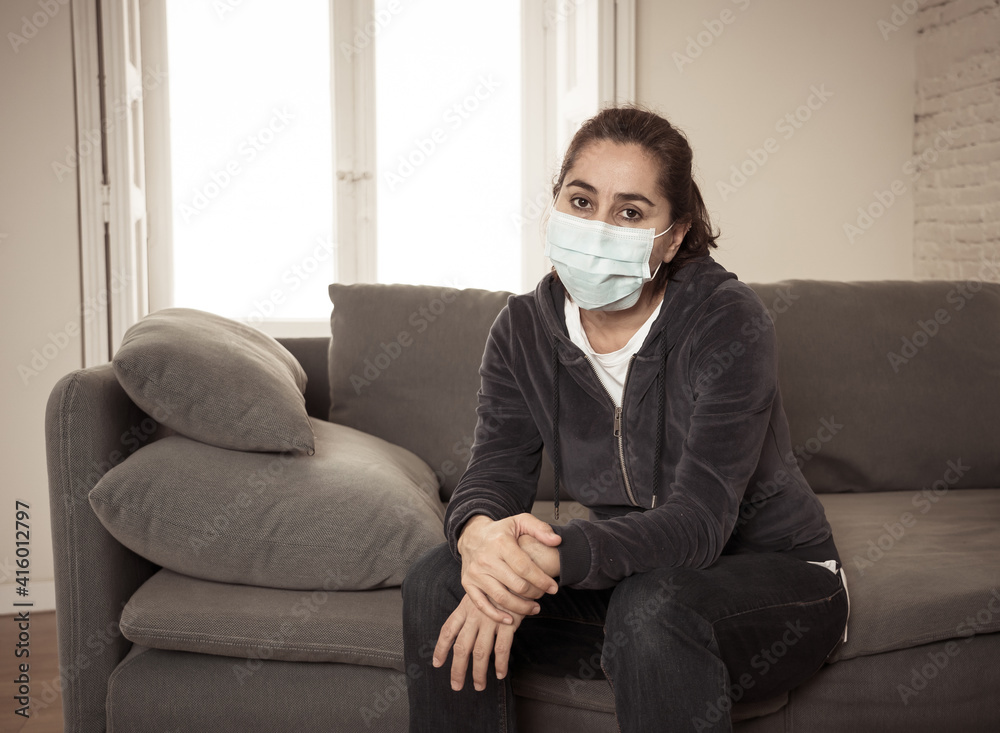 Lonely woman suffering from depression at home during coronavirus lockdown and social distancing Lonely woman suffering from depression at home during coronavirus lockdown and social distancing