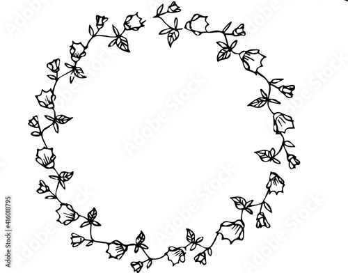 Spring wreath of olive branches with olives. The technique silhouette. The color is black.