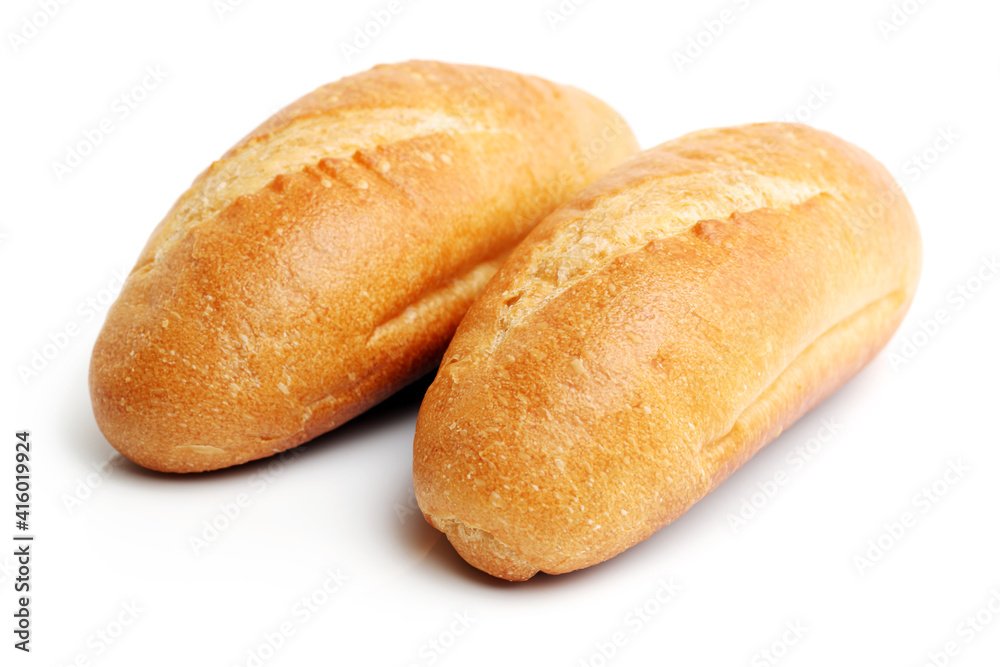 crusty mini baguettes on white surface