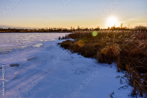 the first ice on the sun at sunset