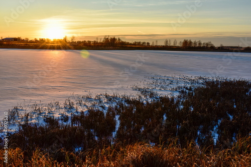 the first ice on the sun at sunset