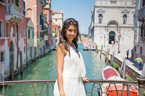 Beautiful Tourist Woman with White Dress  in Venice  Italy 