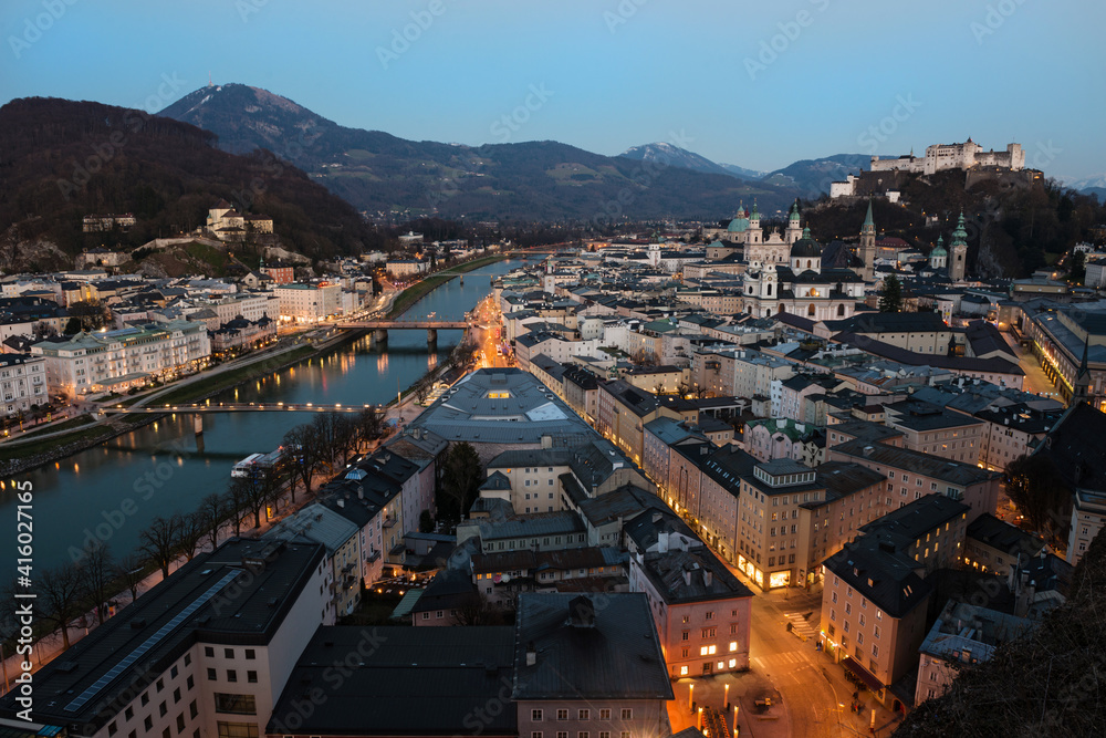 Fototapeta premium Beautiful view of the historic city of Salzburg with Salzach river at night, Austria