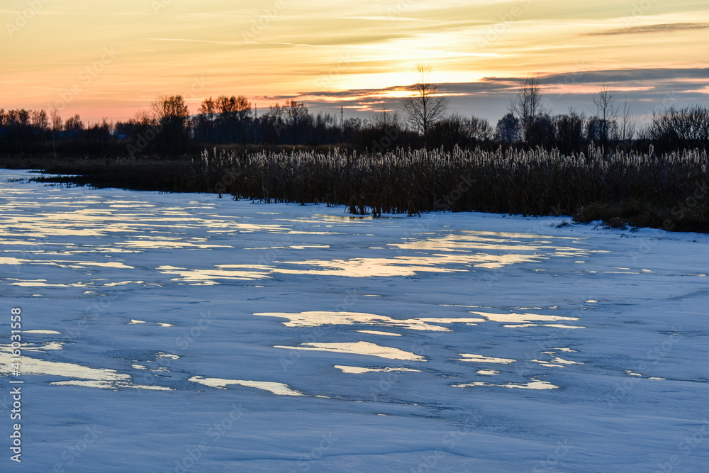 the first ice on the sun at sunset
