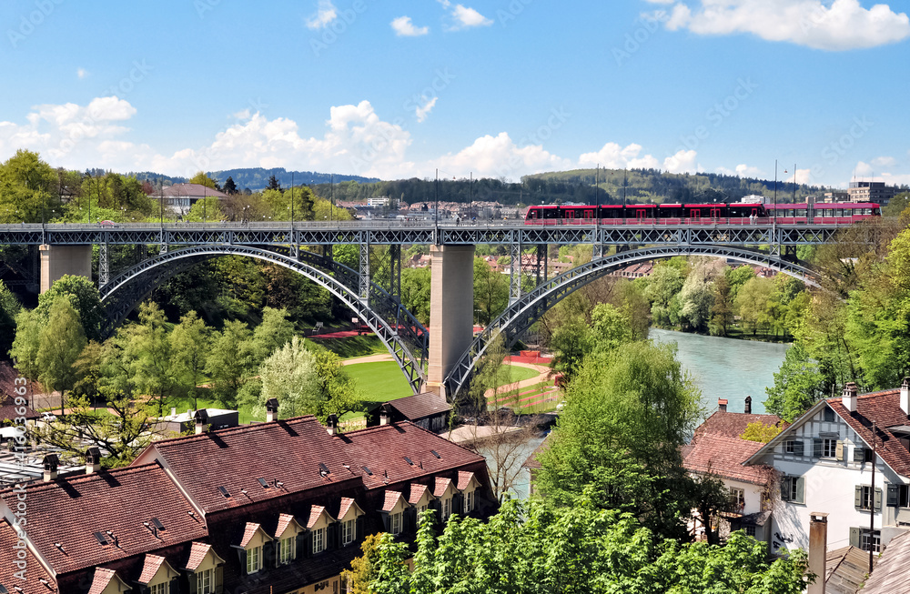 Fototapeta premium Panoramic view on railway bridge over the river Aare in Berne (Bern), Switzerland