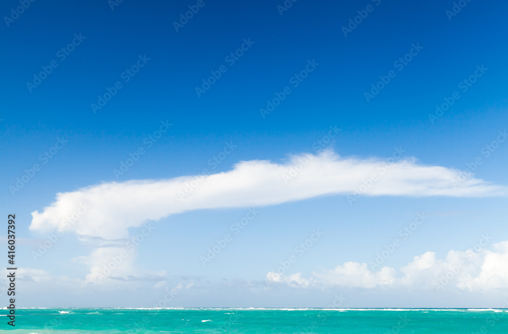 Caribbean Sea under cloudy blue sky on a sunny day