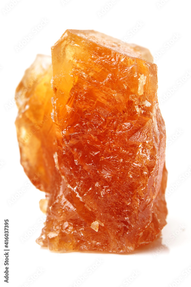 dark crystal sugar on white background
