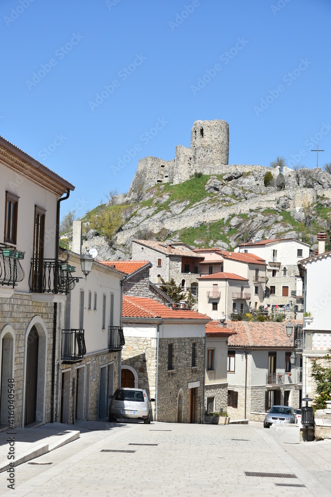 A street among the old stone houses of Rocca San Felice, a medieval village in the province of Avellino. A street among the old stone houses of Rocca San Felice, a medieval village in the province of Avellino.