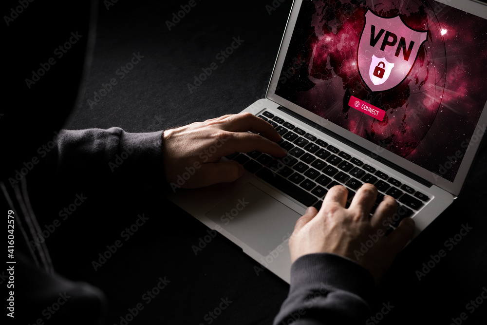 Man using VPN (Virtual Private Network) so surf internet anonymous Man using VPN (Virtual Private Network) so surf internet anonymous
