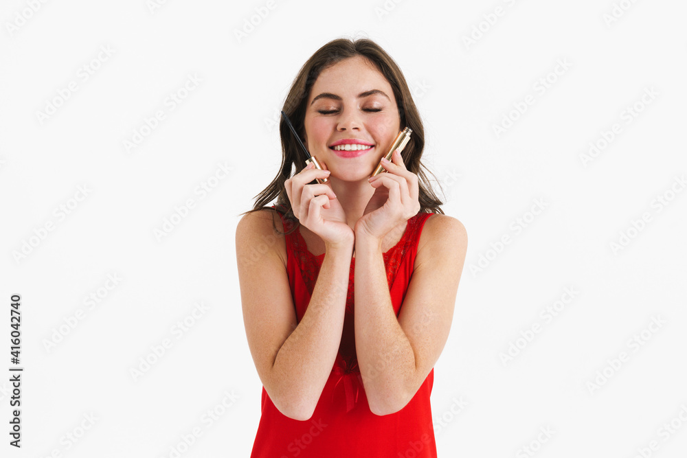 Smiling beautiful caucasian girl posing with mascara Smiling beautiful caucasian girl posing with mascara
