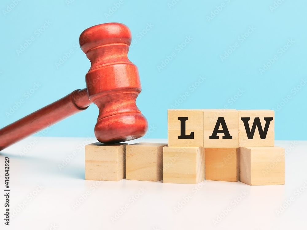 Obraz na plátně Phrase Law on wooden cubes with gavel. Law concept.