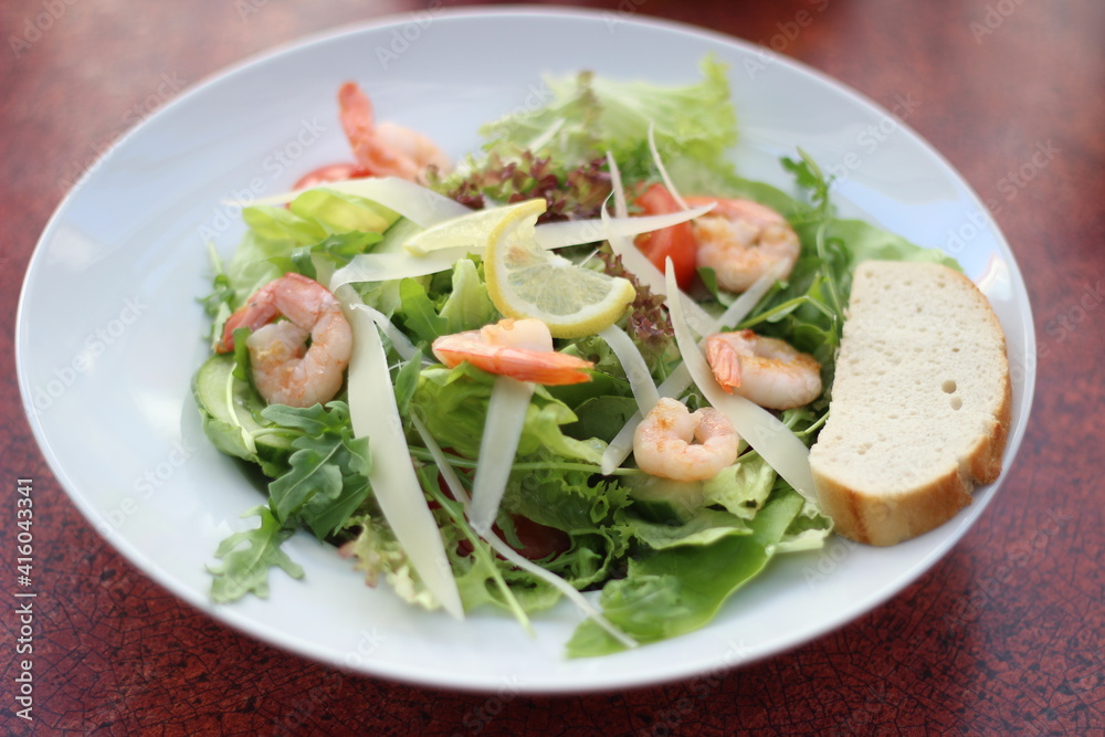 Salad with the prawns in the restaurant 