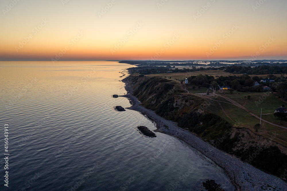 Spodsbjerg Lighthouse and Coastline during Sunrise Spodsbjerg Lighthouse and Coastline during Sunrise