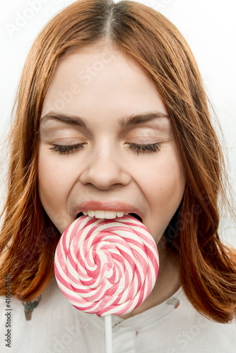 pretty woman licks round lollipop delight dessert sweets