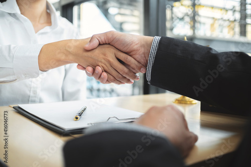 Teamwork colleagues business people handshake after meeting..