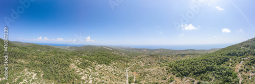Aerial panoramic view of Borovik hill near Tito's Cave on Vis Island in Croatia summer horizon
