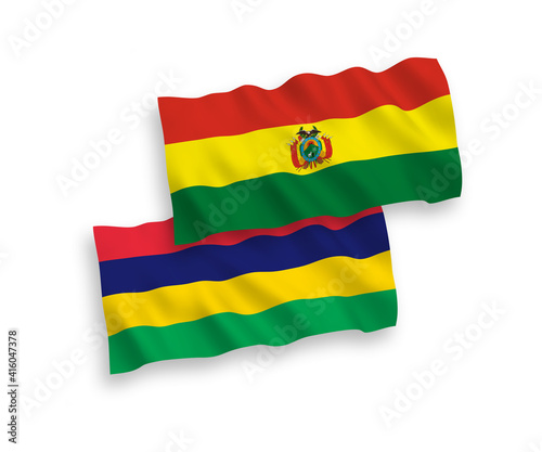 National vector fabric wave flags of Bolivia and Republic of Mauritius isolated on white background. 1 to 2 proportion.