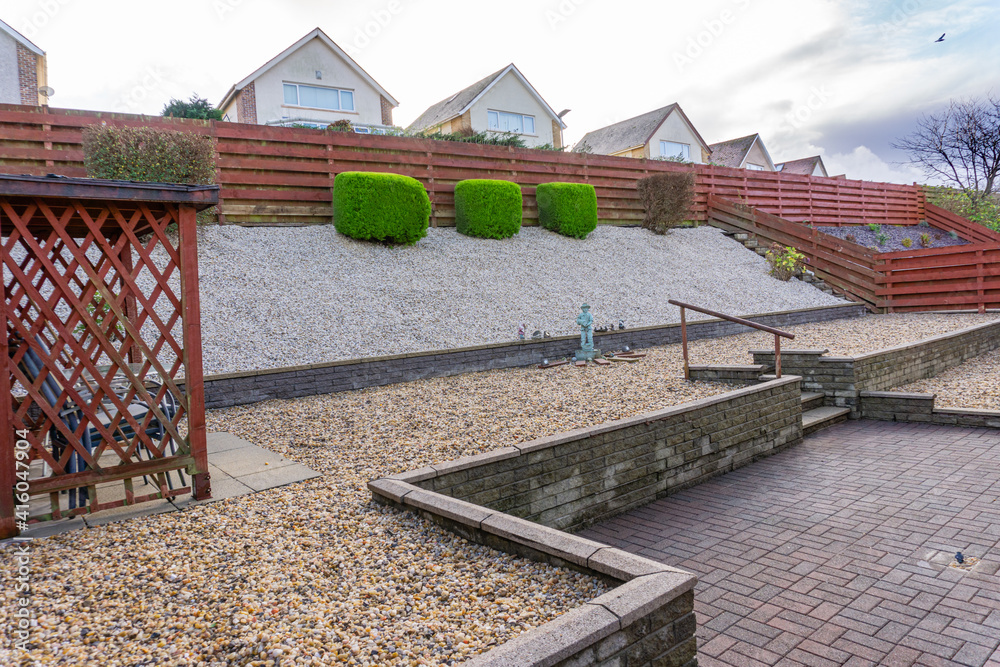New Landscaped garden with quartz gravel, Cotswold gravel new constructed walls and monoblocked areas. New Fyfestone Walls and monoblocked areas. New Landscaped garden with quartz gravel, Cotswold gravel new constructed walls and monoblocked areas. New Fyfestone Walls and monoblocked areas.