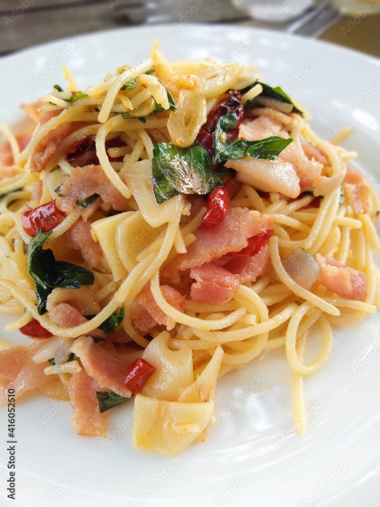 Delicious Thai spicy spaghetti in white plate Delicious Thai spicy spaghetti in white plate