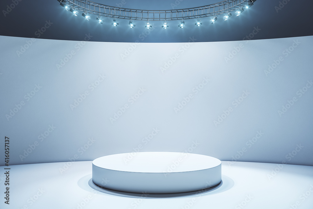 White round podium in empty stylish hall with light wall and floor and led lights on top
