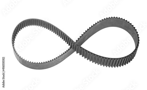 Timing belt folded in the shape of an infinity sign. Isolated on white background.