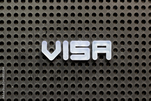 White color letter in word visa on black pegboard background