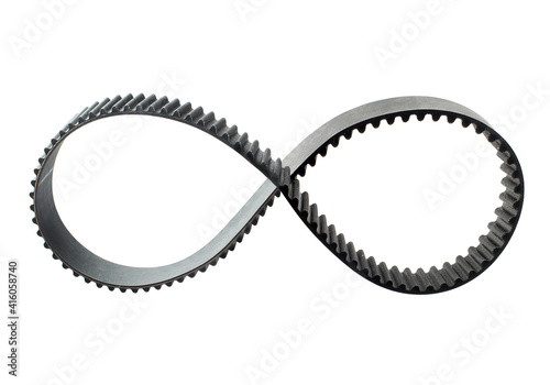 Timing belt folded in the shape of an infinity sign. Isolated on white background.