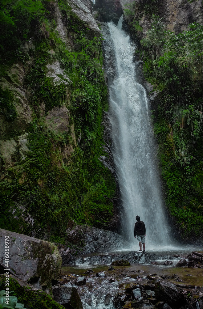 Man and waterfall 