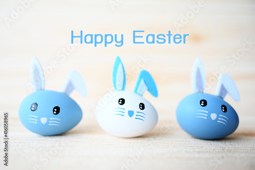 happy easter text with eggs bunny Easter The minimal concept of Easter