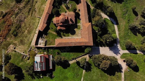 View from drone of ancient ruins, monastery and beautiful, green fields. photo