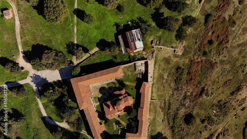 View from drone of ancient ruins, monastery and beautiful, green fields. photo