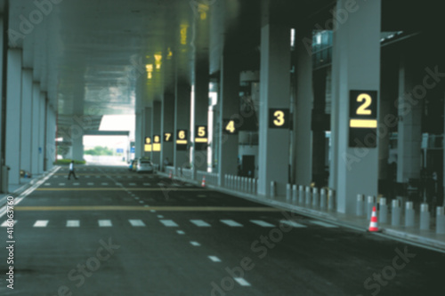 Fototapeta Naklejka Na Ścianę i Meble -  Gloomy blurred airport background